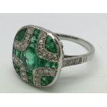 A platinum Art Deco- style emerald and diamond pan