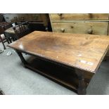 A large solid oak coffee table