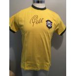 Pele Signed Brazil Football Shirt: Short sleeve yellow shirt signed clearly to front by Pele with