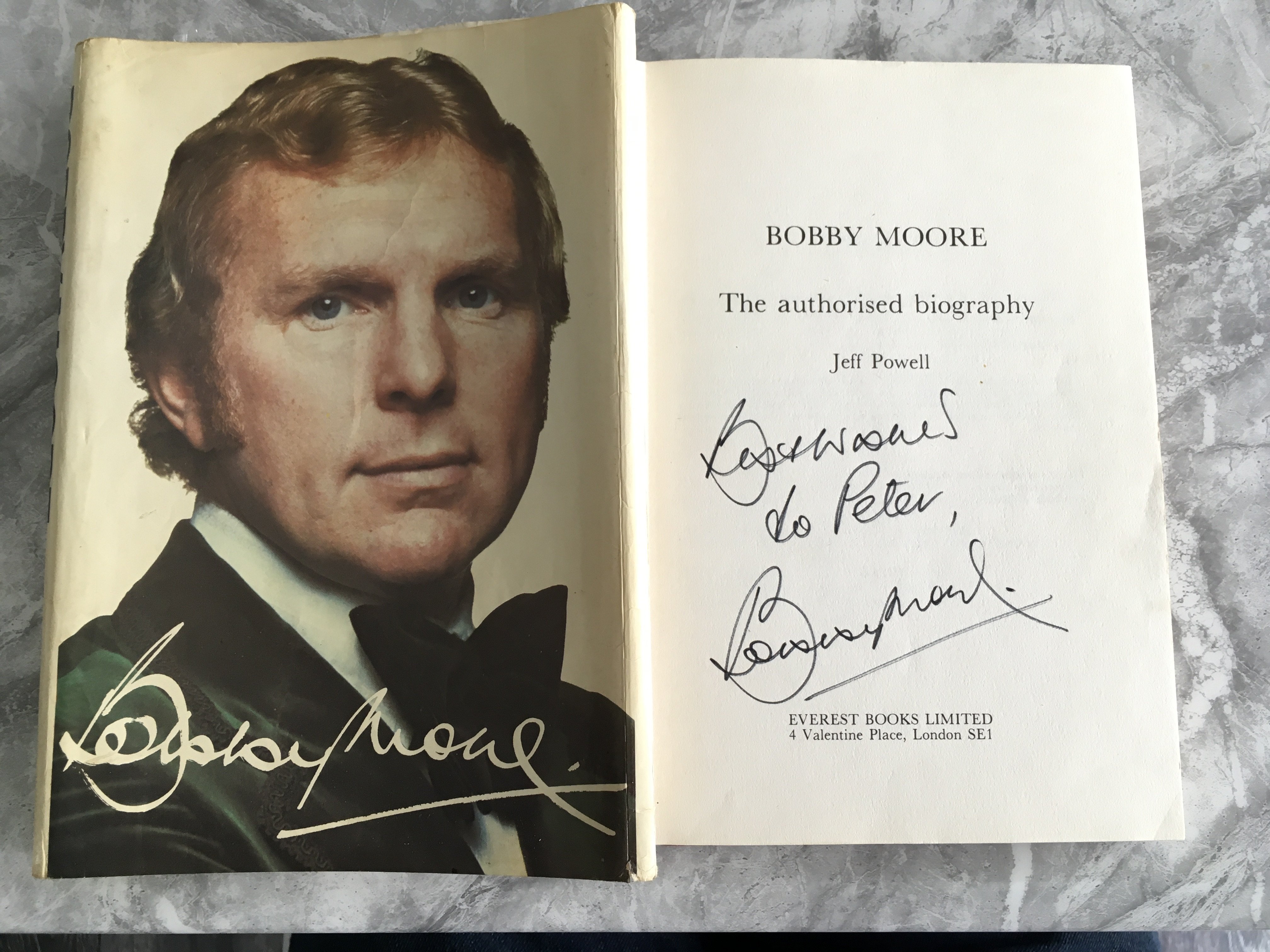 Bobby Moore Signed Football Book: The 1976 book by Jeff Powell with Moore to front wearing bow