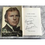 Bobby Moore Signed Football Book: The 1976 book by Jeff Powell with Moore to front wearing bow
