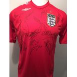 2006 Signed England Away Football Shirt: Replica short sleeve mens red shirt. Hand signed to front