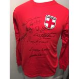 England 1966 World Cup Signed Football Shirt: Red long sleeve replica shirt with badge stating