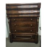 A Victorian Mahogany large Scottish chest of drawers the top above a cushion fronted drawer above