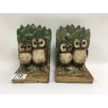 A pair of Doulton Lambeth owl bookends. Artist mark NL.