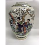 A large Chinese pottery vase with transfer printed decoration. 32cm.