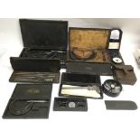 A collection of engineering precision tools including Rev counters, a wind measure, a Vernier and