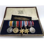 A miniature set of WW1 medals inc mercantile marine miniature with original box from toye and