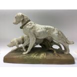 A Royal Dux figure group in the form a pair of spaniels - NO RESERVE