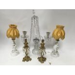 A pair of German White porcelain figural lamps, a pair of gilt brass candlesticks and a glass