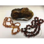 A large piece of amber with scorpion enclosed within plus two amber necklaces - NO RESERVE
