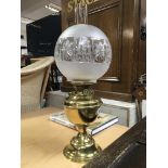 A brass Duplex oil lamp with cut glass shade.