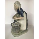 A large Royal Copenhagen figure of a washerwoman.