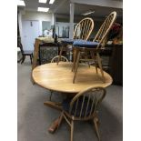 A 1970s/80s Ercol dining suite (table +1 leaf and 4 chairs).