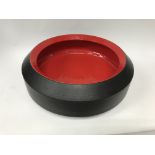 A large 1970s/80s black and red Bitossi ceramic studio pottery bowl by Aldo Londi.