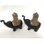 A pair of heavy 19th century Indian bronze censors with gilt brass lift off howdahs