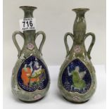 A pair of Royal Doulton pottery vases with unusual panel decoration. H.22cm.