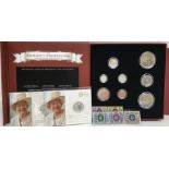A commemorative coin and stamp set plus 2 £20 fine silver coins. (31/499)
