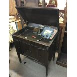 An oak cased Columbia grafonla gramophone plus 2 Little Tots songs and games record folders etc - NO