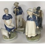 4 Royal Copenhagen porcelain figures. Tallest 26cm