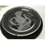 A decorative glass dish engraved with a figure holding a bird having Art Deco influences - NO