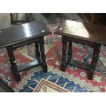 A pair of oak joint stools with rectangular tops on turned legs United by stretchers.