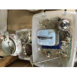 A porcelain salad bowl and servers plus a collection toon of mixed silver plated items.