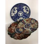 2 Japanese Imari plates 24/21cm diameter and a blue and white Chinese dish with transfer