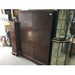 A large compactum wardrobe..