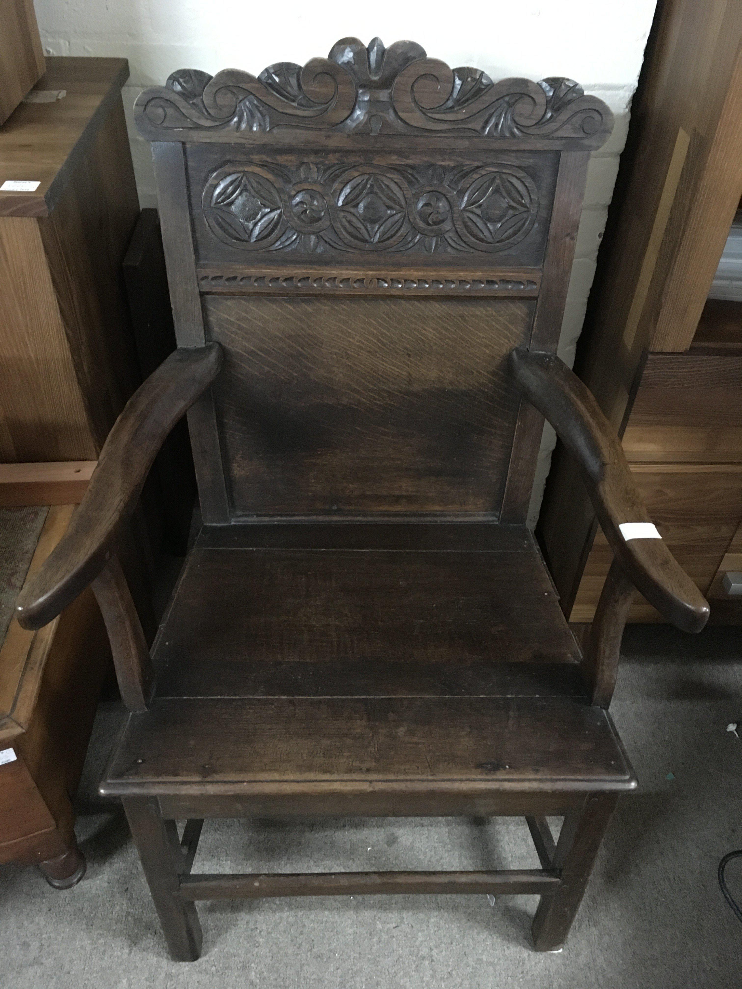 An 18th century provincial oak chair with carved back, possibly of East Anglian origin - NO RESERVE
