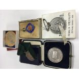 A silver drum award (22.8g) and 4 additional awards/commemorative medals.
