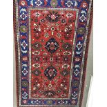A Quality hand knotted Middle Eastern rug with a g