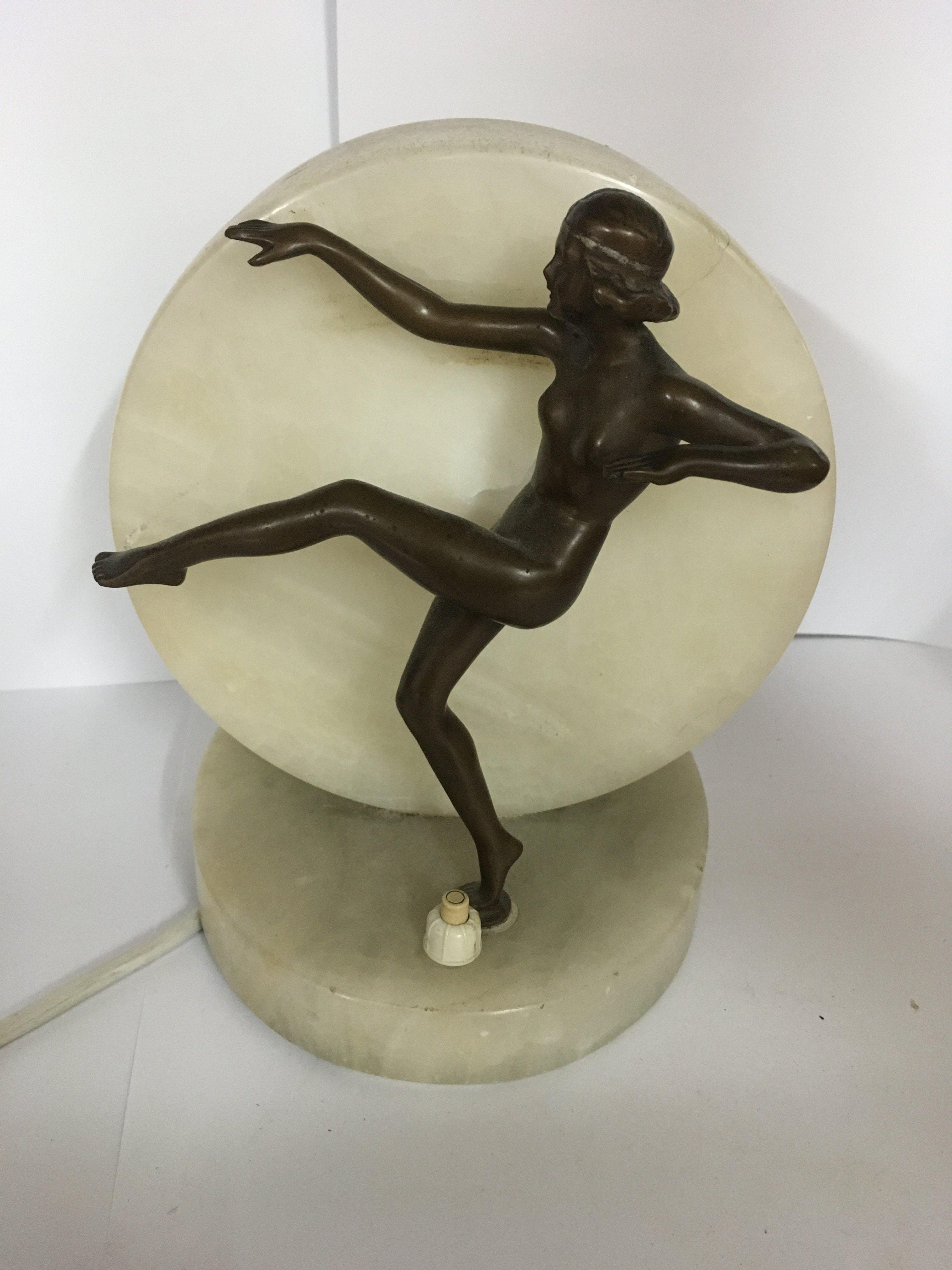 A Art Deco side lamp in the form a nude maiden 19 cm .