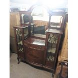 An Edwardian mirror backed inlaid etagere, w.132 h.214.