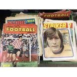 A crate containing a collection of vintage football magazines, various titles including Score,