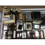 A collection of vintage lighters etc.