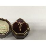 An Edwardian 9 ct gold signet ring inset with amethyst ston Chester 1906 size N .