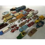 A collection of play worn diecast vehicles including Corgi and Matchbox