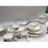 A Royal Albert Porcelain Memory Lane pattern dinner service with plates and bowls serving dishes (