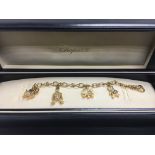 A heavy 18ct gold Chopard charm bracelet set with diamonds in original box, approx 48.2g.