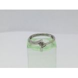 An 18ct white gold ring set with a princess cut solitaire diamond, approx.25ct, approx 1.8g and