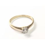 An 18carat gold ring set with a solitaire brilliant cut diamond approx 0.15 carat. Ring size I.