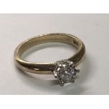 A 9carat gold solitaire diamond ring the brilliant cut diamond approximately 0.20 carat.