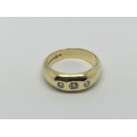 A gents 18ct gold three stone diamond ring, approx .25ct, approx 10g and approx size R.
