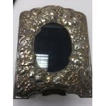 A silver photo frame of naturalistic design Birmingham hallmarks 1993 23 cm by 19 cm