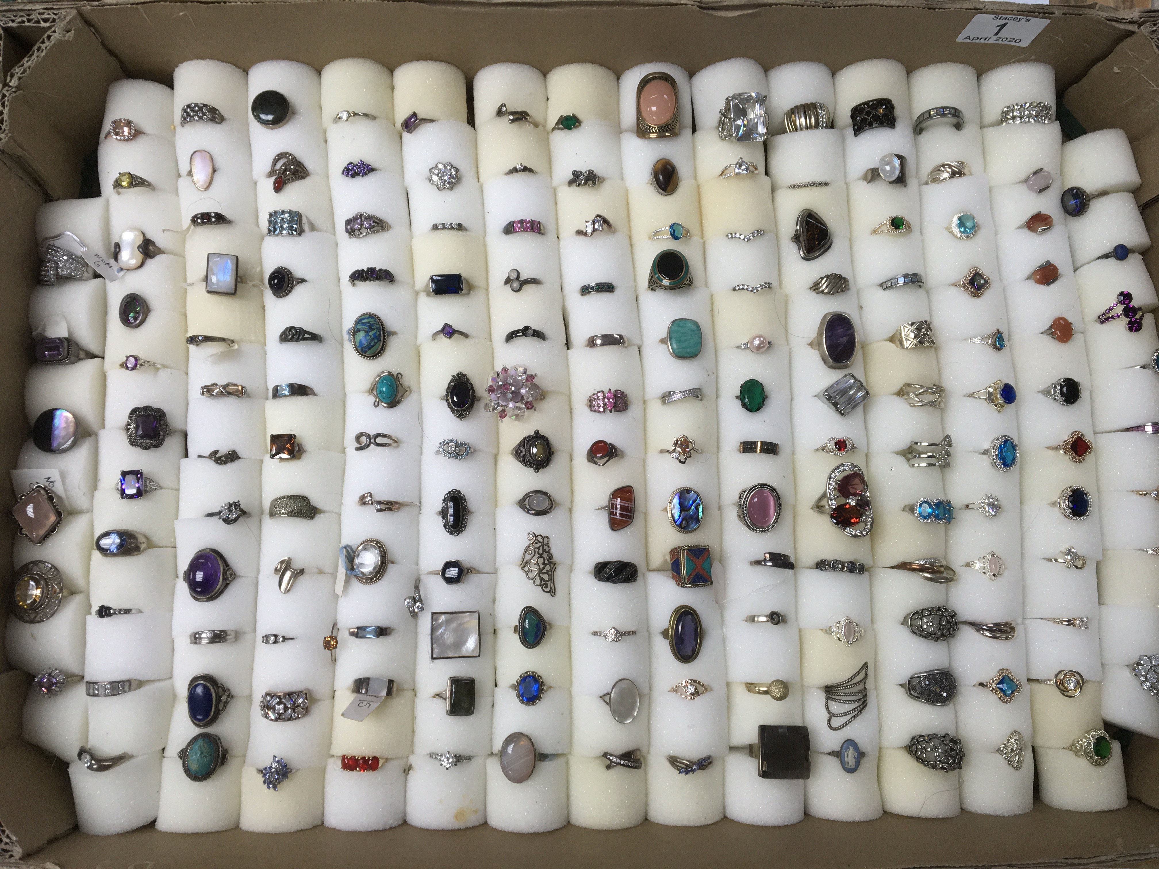 A collection of 150+ mixed silver and costume jewellery rings