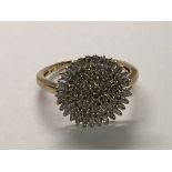 A 9cart gold diamond cluster ring approximately 0.50 of a carat total weight ring size P.