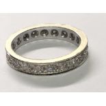 A 9carat gold diamond set full eternity ring. Ring Size L.