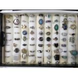 A collection of mixed silver and costume rings (81).