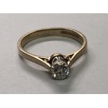 An 18carat gold ring set with a brilliant cut diamond approx 0.25 of a carat. Ring size N.